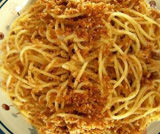 Spaghetti con mollica di pane e ali...