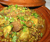 Tajine di agnello alle fave e carciofi